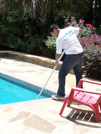 Pool Medic performing pool maintenance services